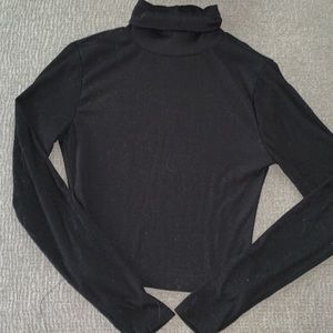 A black turtleneck shirt only been worn to try on.
